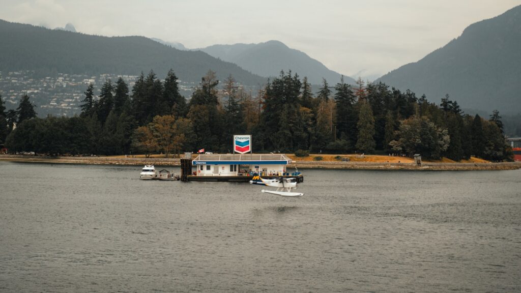 A body of water with a boat in the middle of it