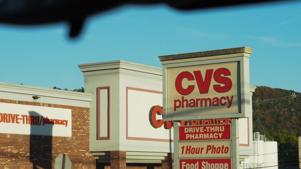 A cv's pharmacy sign in front of a store. cvs stock forecast