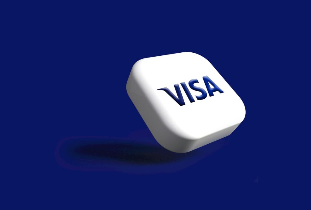 a white dice with the word visa on it, visa stock forecast